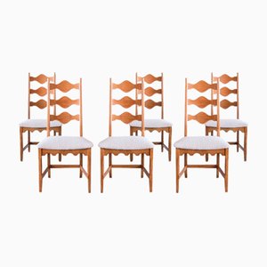 Dining Chairs in Oak and Ivory Bouclé by Henning Kjærnulf, Denmark, 1960s, Set of 12