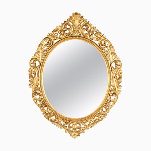 Espejo florentino antiguo oval de madera dorada, siglo XIX