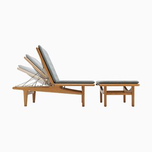 Dormeuse e poltrona modello Ge1 attribuite a Hans J. Wegner per Getama, 2022