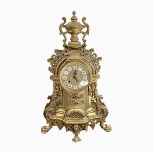 Reloj de manto victoriano de latón decorado, década de 1880