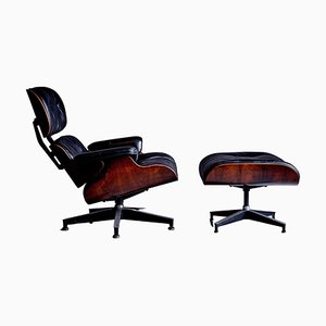 Early Model 670 Lounge Chair and 671 Footstool in Rosewood by Charles & Ray Eames for Herman Miller, 1960s, Set of 2