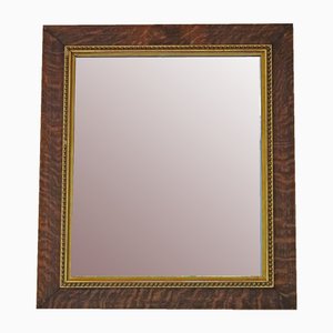 Espejo de sobremanto grande de roble y dorado, siglo XIX