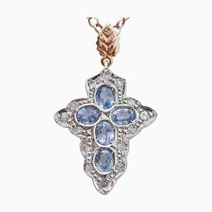 Kreuzanhänger aus Roségold und Silber mit Saphiren und Diamanten