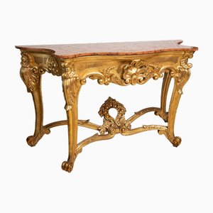 Consola napolitana, siglo XIX de madera tallada y dorada con tablero de mármol rojo de Luigi Filippo