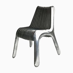 Steel in Rotation Chair by Zieta