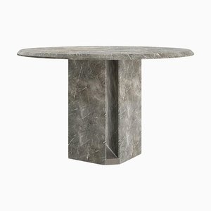Tavolo da pranzo Delos rotondo in marmo di Giorgio Bonaguro