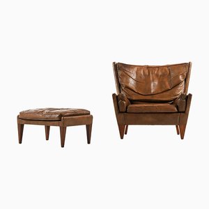 Lounge Chair and Stool in Rosewood and Brown Leather attributed to Illum Wikkelsø, 1960s, Set of 2