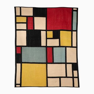 Alfombra o tapiz al estilo de Piet Mondrian