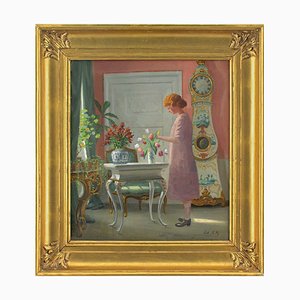 Adolf Heinrich-Hansen, Interior with Girl Arranging Flowers, 1920s, Oil on Canvas, Framed