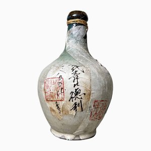 Botella de sake de cerámica esmaltada, años 20