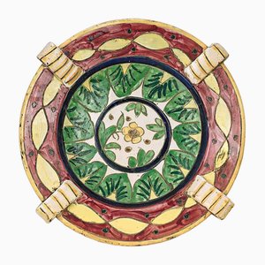 Plato italiano antiguo de terracota con decoración floral