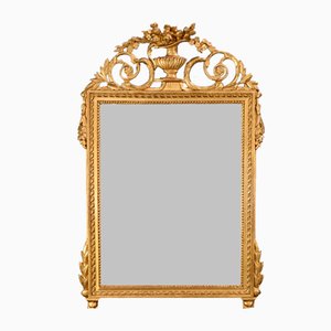 Espejo de madera dorada estilo Luis XVI, de principios del siglo XIX