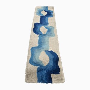 Teppich mit blauem Muster