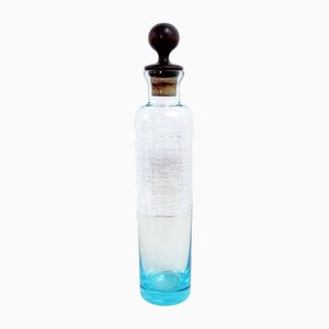 Botella vintage de vidrio azul, años 70