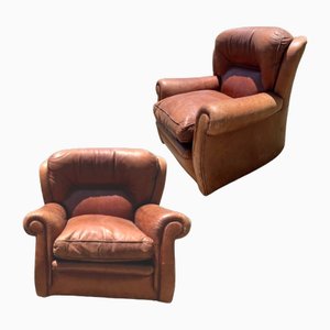 Sillones Mid-Century de cuero. Juego de 2