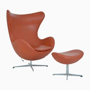 Egg Armchair with Footrest by Arne Jacobsen for Fritz Hansen, 1970s, Set of 2
