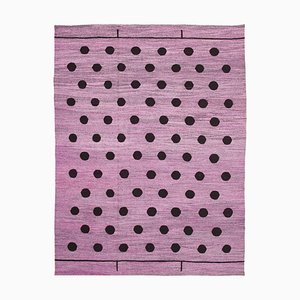 Alfombra Kilim de tejido plano de lana rosa de Anatolia