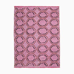 Alfombra Kilim de lana geométrica tejida a mano en rosa