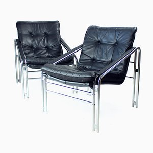 Mid-Century Lounge Chairs in Chrome and Faux Leather, 1960s, Set of 2