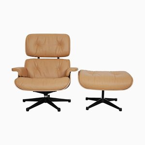Lounge Chair with Ottoman in Caramel Coloured Leather by Charles Eames for Vitra, Set of 2