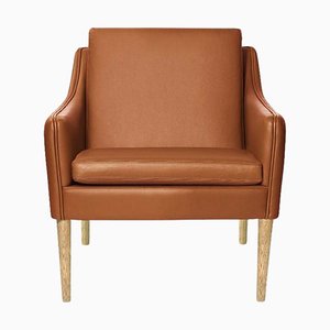 Mr. Olsen Lounge Chair in Smoked Oak and Cognac Leather by Warm Nordic