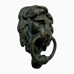 Battente vintage a forma di testa di leone in metallo patinato