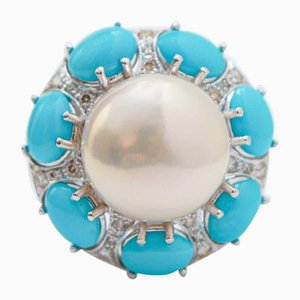 Anillo de oro blanco de 14 kt con perlas, turquesas y diamantes