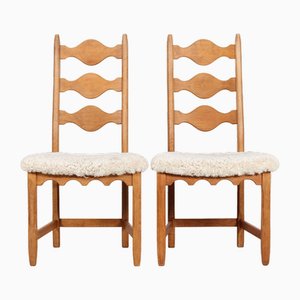 Danish Dining Chairs in Oak & Sheepskin by Henning Kjærnulf, 1970s, Set of 2