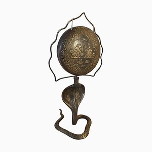 Gong asiatico a forma di cobra in bronzo