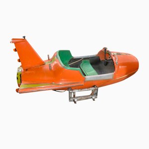 Avión carrusel naranja y verde, años 60