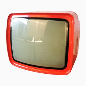 TV portátil vintage roja de Grundig, años 70
