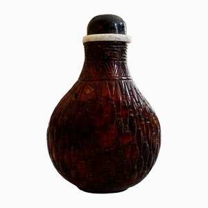 Carved Asian Amber Snuff Bottle