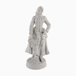 Figura de porcelana de la criada popular, Rudolstadt, década de 1880