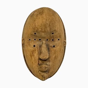 Máscara de madera tribal de principios del siglo XX
