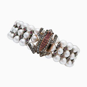 Bracciale con perle, granati, rubini, diamanti, oro rosa e argento