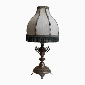 Table Lamp with Ornate Brass Base and Segmented Fabric Shade
