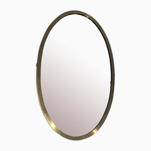 Neoclassical Style Oval Brass Mirror in the style of Maison Jansen, 1940s