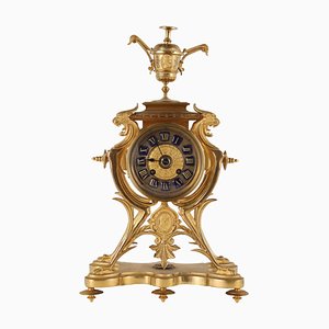 Reloj de soporte de bronce dorado