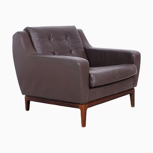 Sillón vintage de cuero marrón con patas de palisandro de Porfilia Werke, años 60