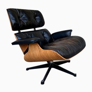 Vintage Model 670 Lounge Chair in Rosewood by Charles & Ray Eames for Herman Miller, Fehlbaum-Production, 1960s