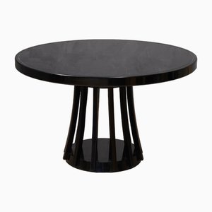 Mesa de comedor redonda de madera negra de Angelo Mangiarotti, 1970