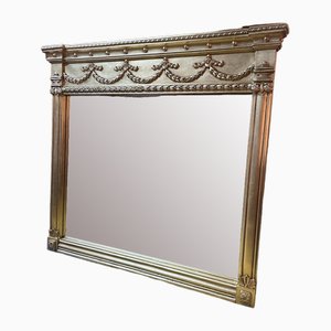 Specchio da camino in legno dorato intagliato in stile Regency