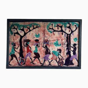 Arte batik africano enmarcado que representa una escena rural