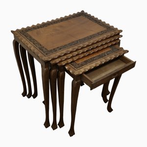 Tavoli ad incastro in teak intagliato, anni '50, set di 4