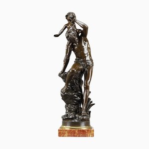 Escultura de bronce con un niño de Gaston Leroux, década de 1900