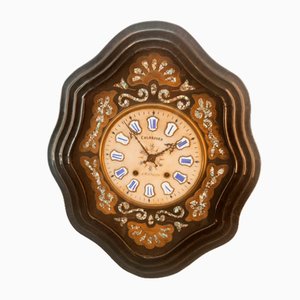 Reloj de pared vintage de madera