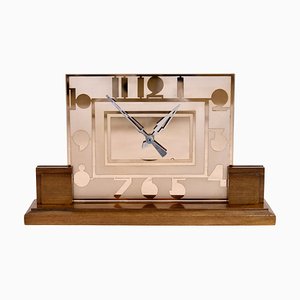 Reloj de mesa Art Déco de vidrio rosalino y números, años 30