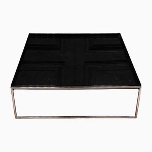 Mesa de centro con bandeja negra con base de cromo de Kartell