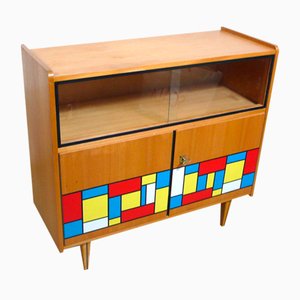 Small Mid-Century 2-Door Sideboard with Mondrian Style Decor and Sliding Glass Doors, 1960s