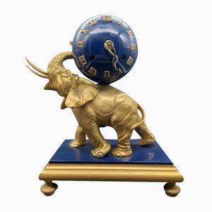 Reloj elefante de bronce, década de 1800